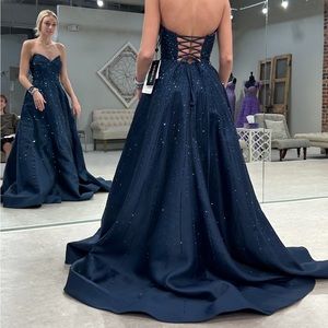 Sherri Hill gown . Full skirt, pockets, corset back. Worn once